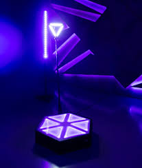 360 video booth illuminated in purple event lighting